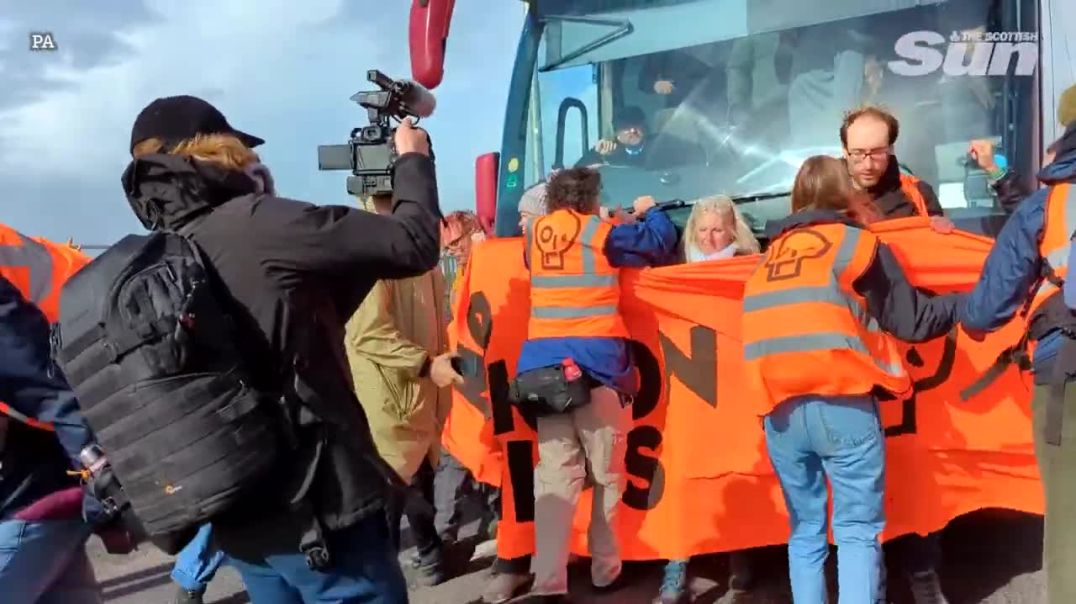 Bus driver Pushes Just Stop Oil Protesters Blockade